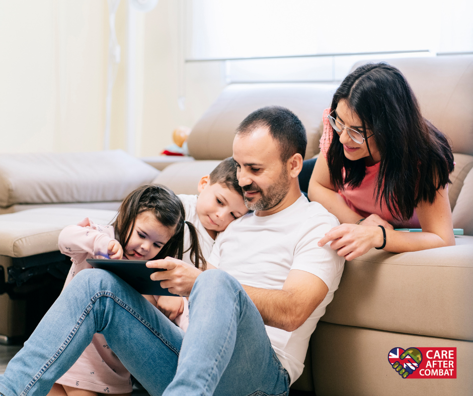 Family spending time together at home, representing support for military families in the UK.